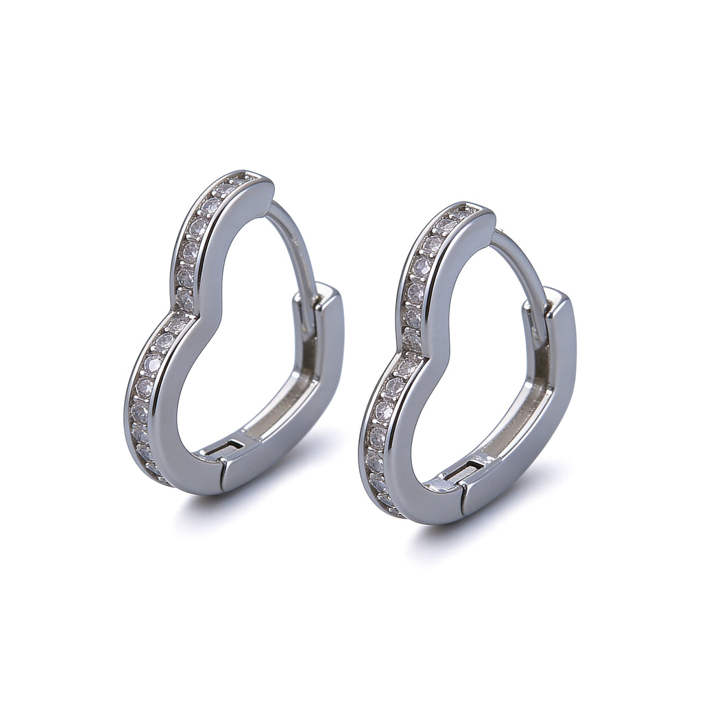 Crystal heart hoop earrings in silver with CZ stones.