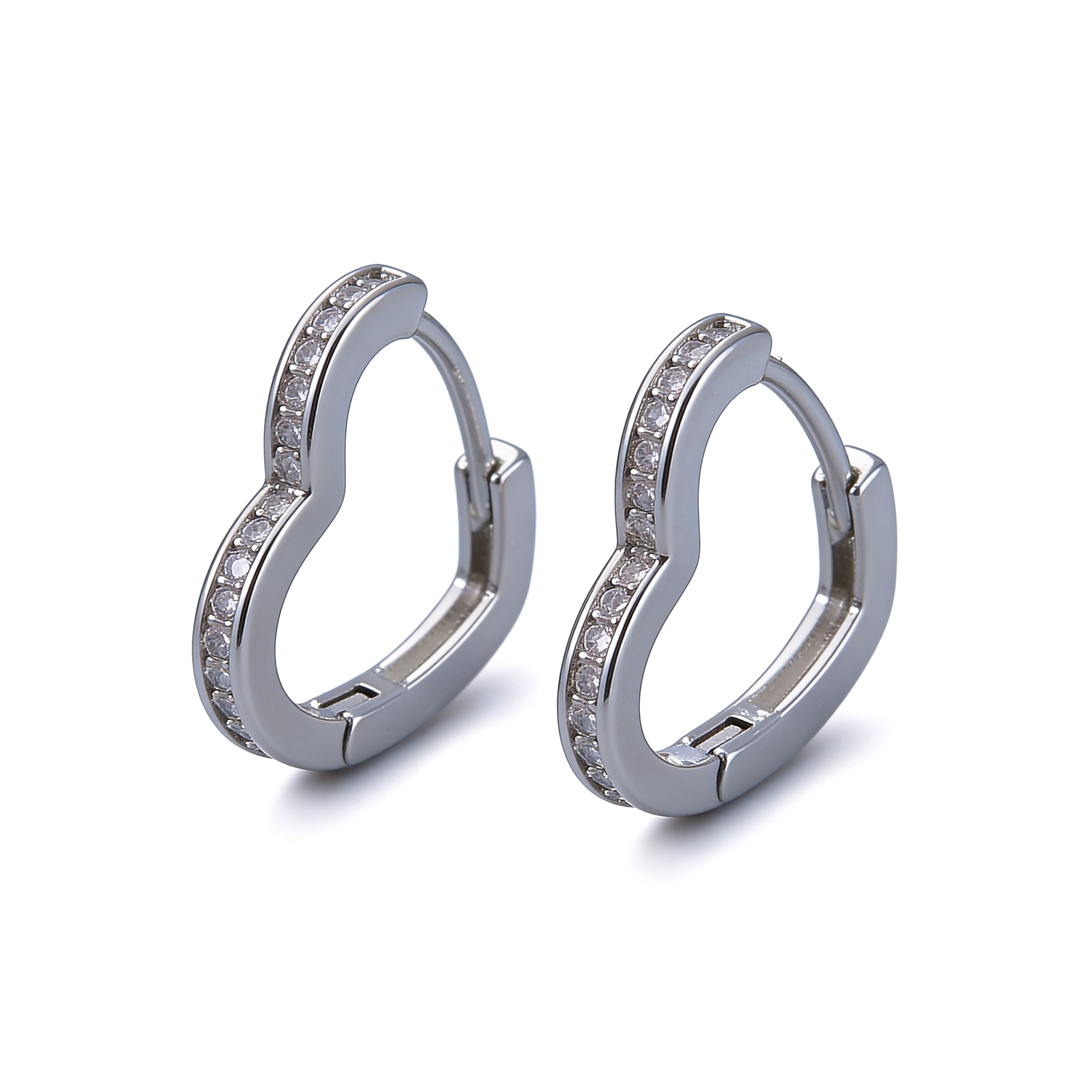 Crystal heart hoop earrings in silver with CZ stones.