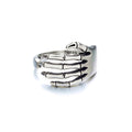 Adjustable silver plated skeleton hand ring.