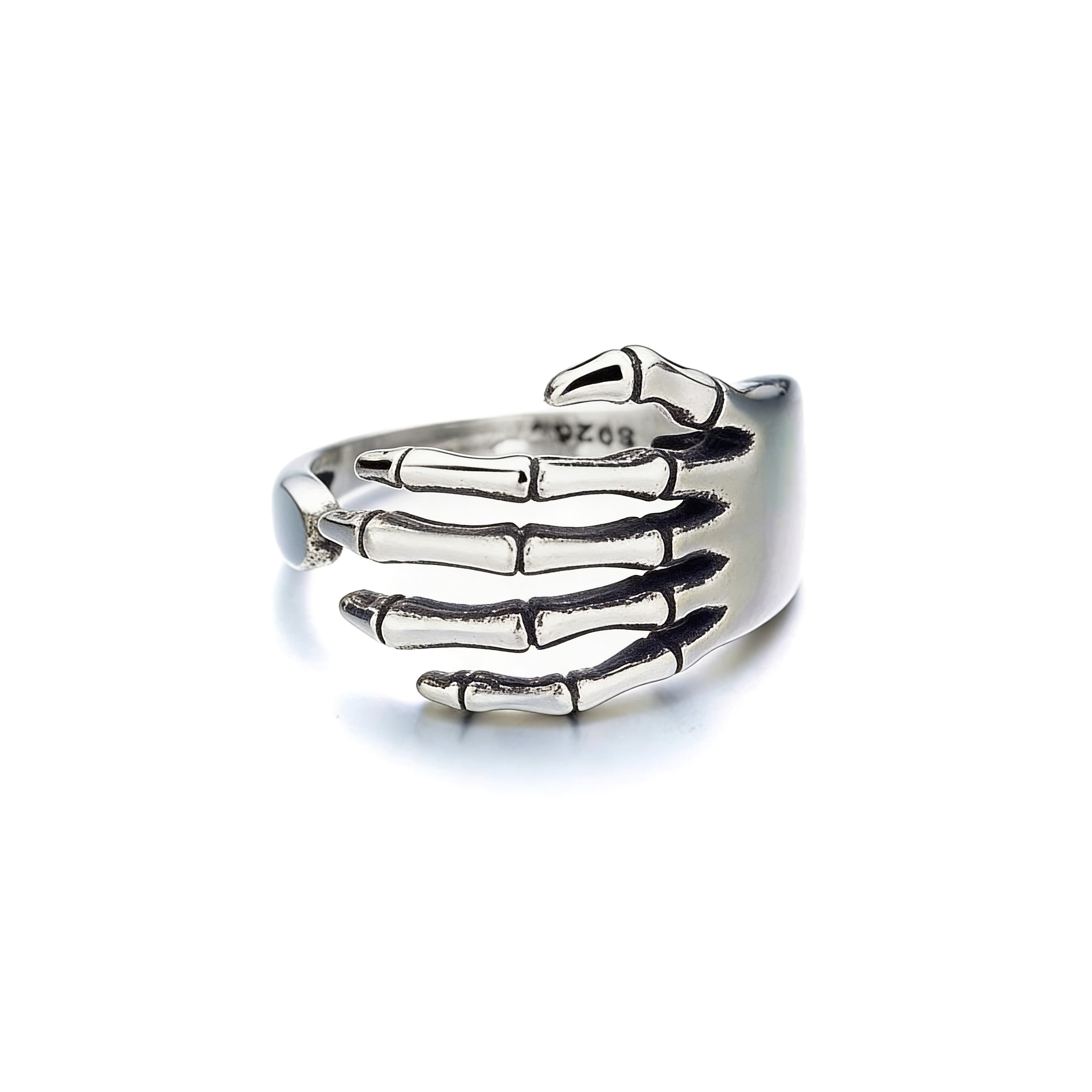 Adjustable silver plated skeleton hand ring.