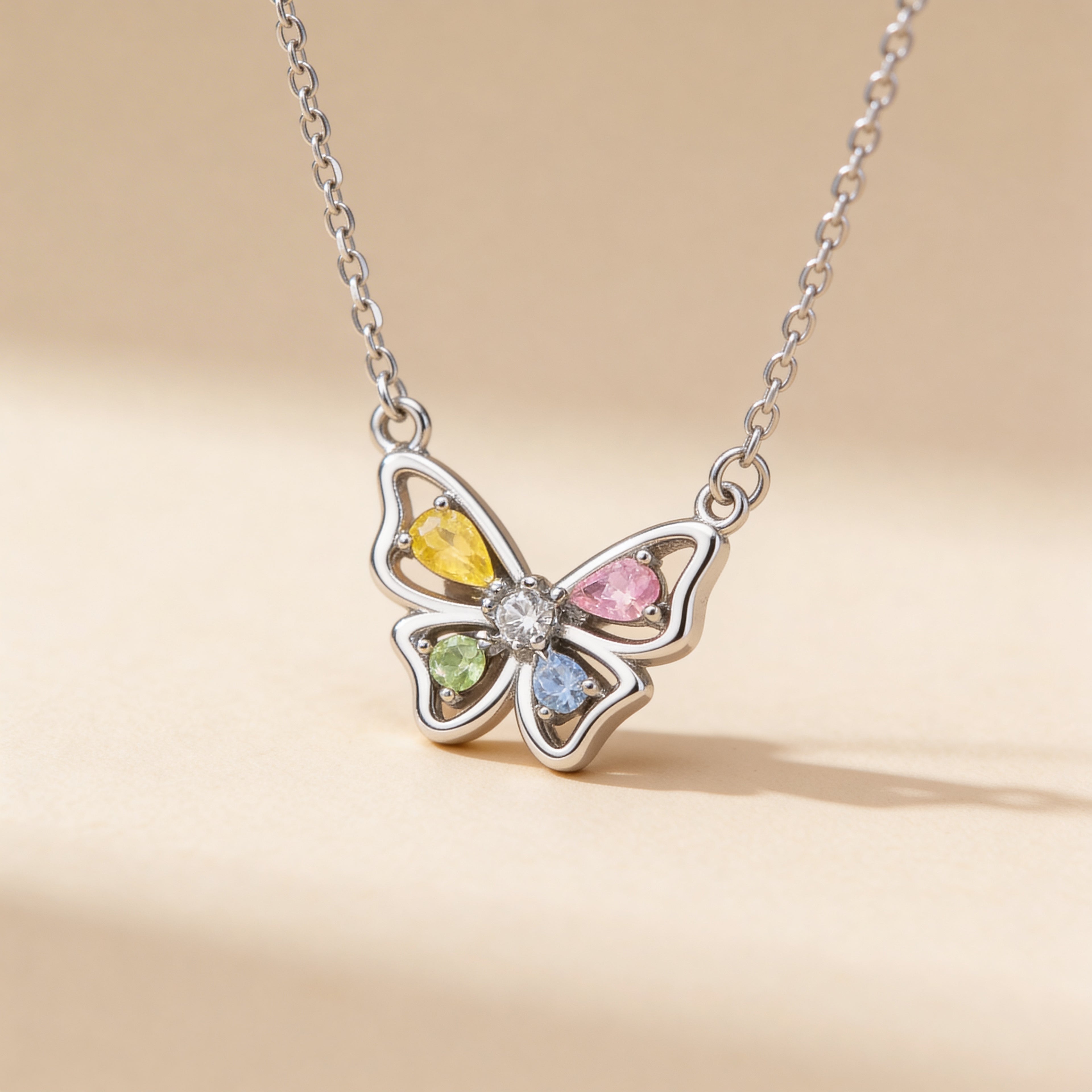 Sparkling butterfly crystal necklace close-up.
