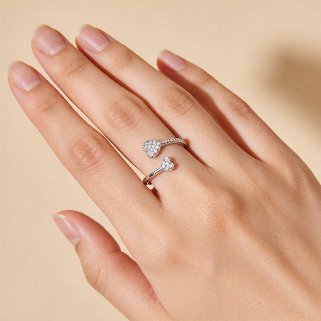 Adjustable silver double heart ring with sparkling CZ accents, dainty love ring for women, anniversary or Valentine’s gift idea.