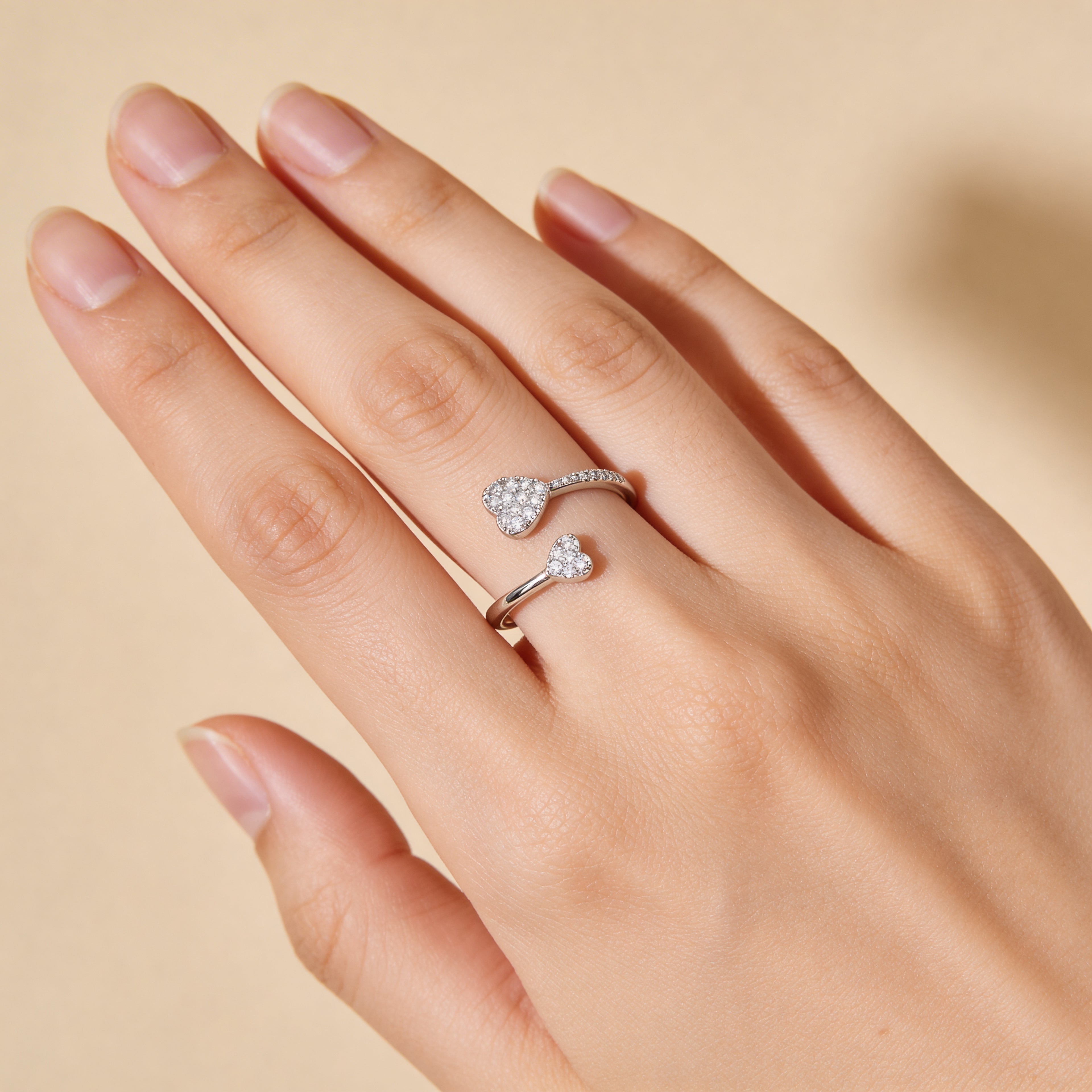 Adjustable silver double heart ring with sparkling CZ accents, dainty love ring for women, anniversary or Valentine’s gift idea.