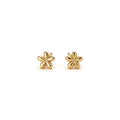 Tiny gold flower stud earrings.
