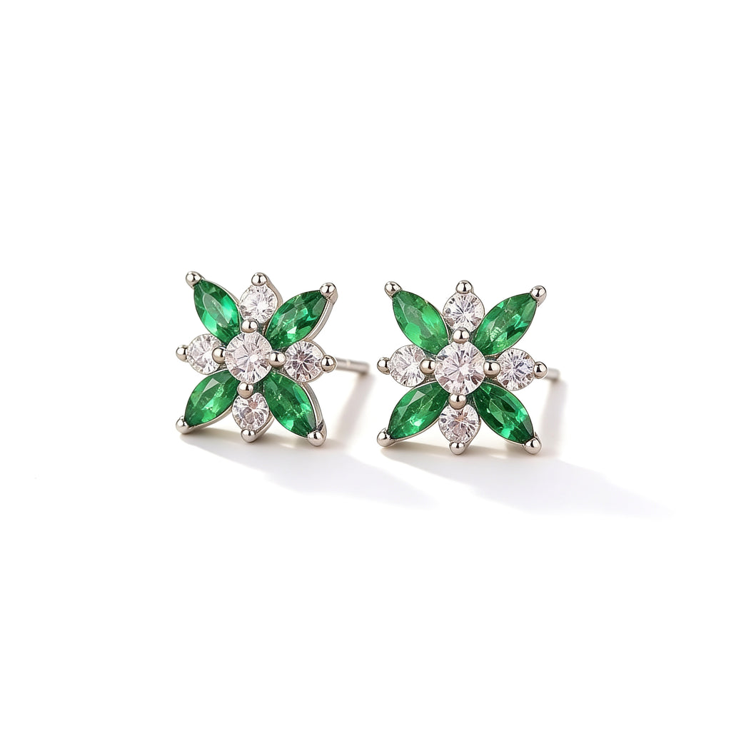 Front view of silver plated flower stud earrings with green crystal petals and sparkling white cubic zirconia stones