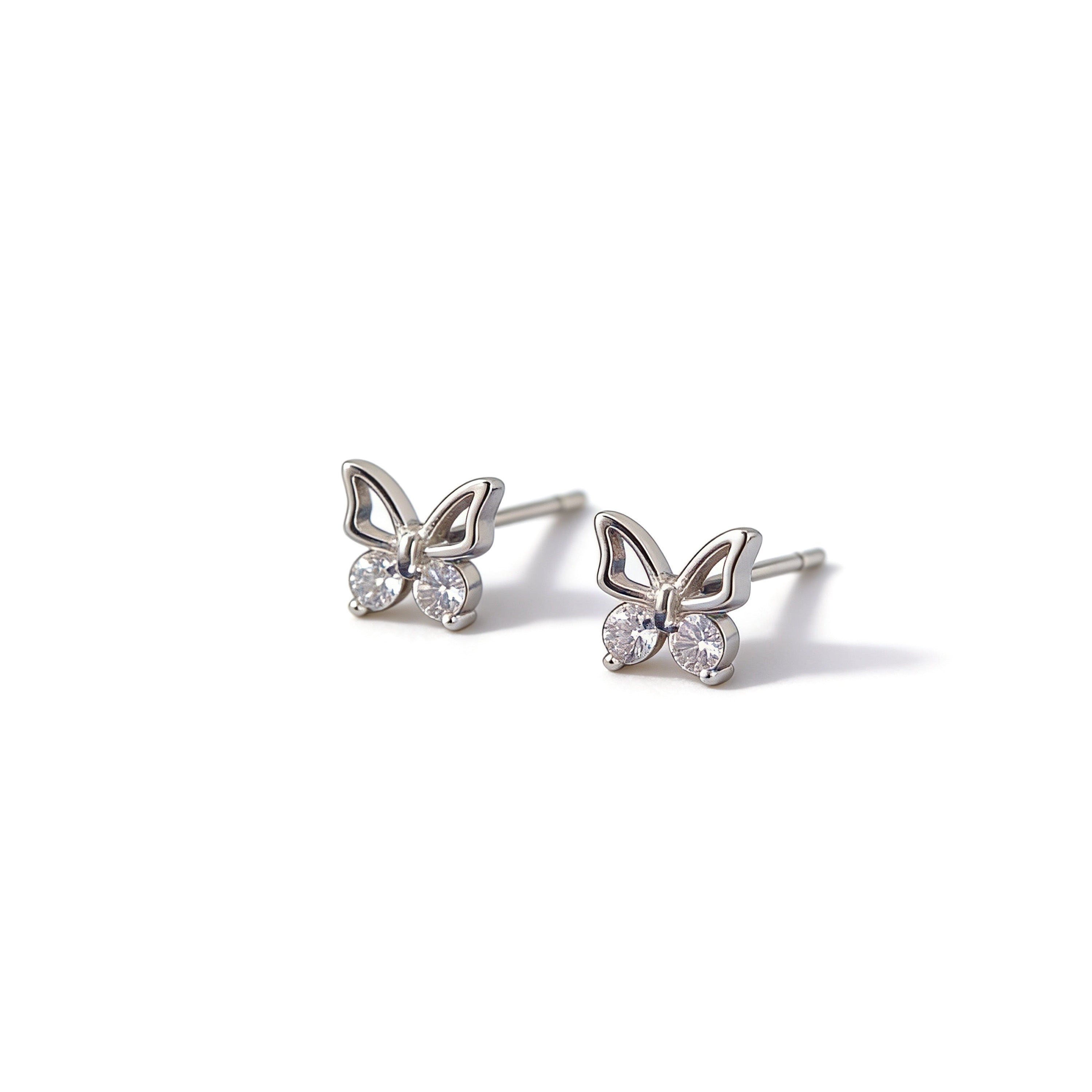 Tiny silver plated butterfly stud earrings with CZ.
