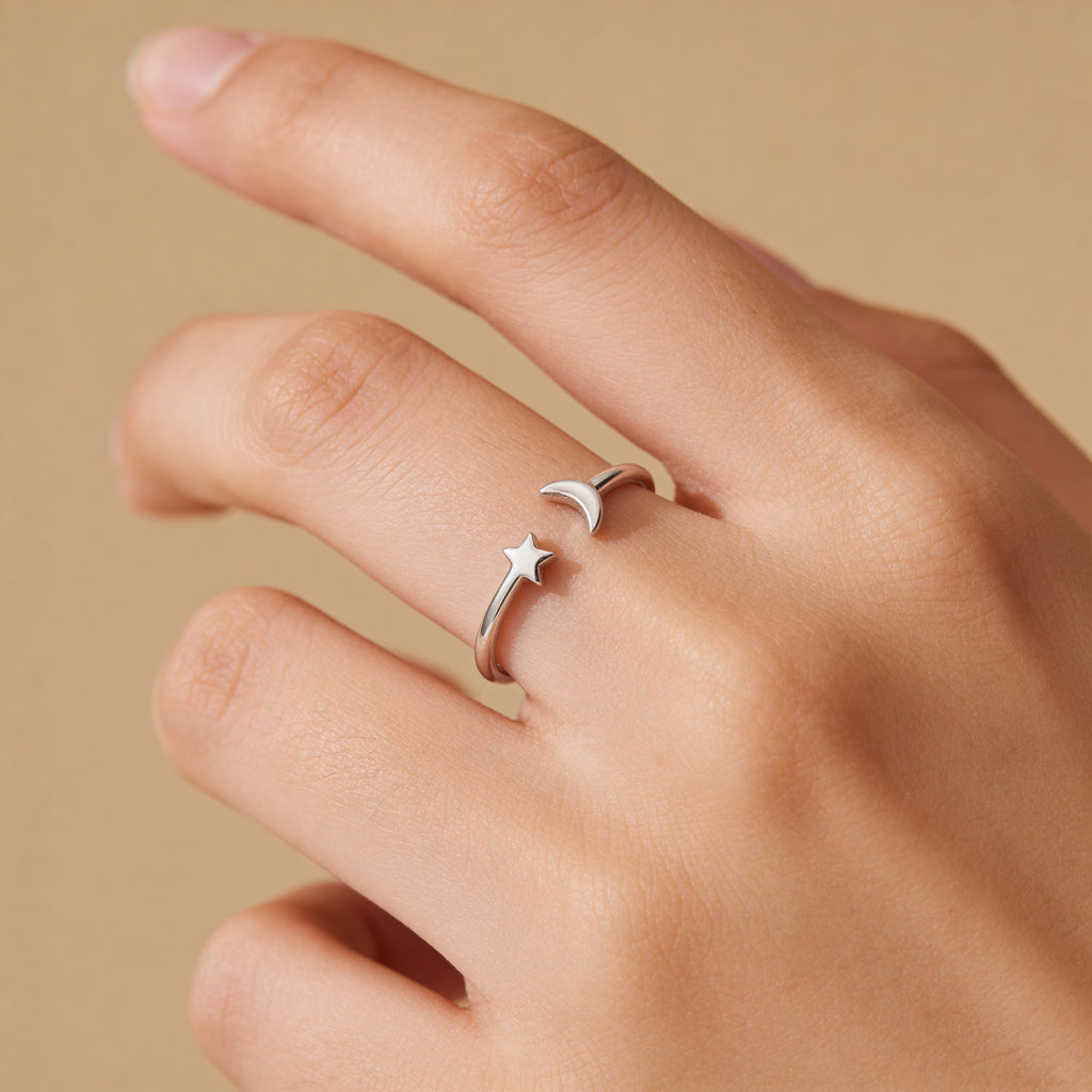 Minimal silver moon and star adjustable ring celestial jewellery close up