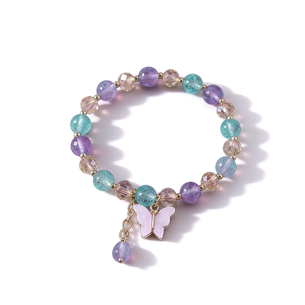 Multicolored beaded bracelet with a butterfly charm on a white background