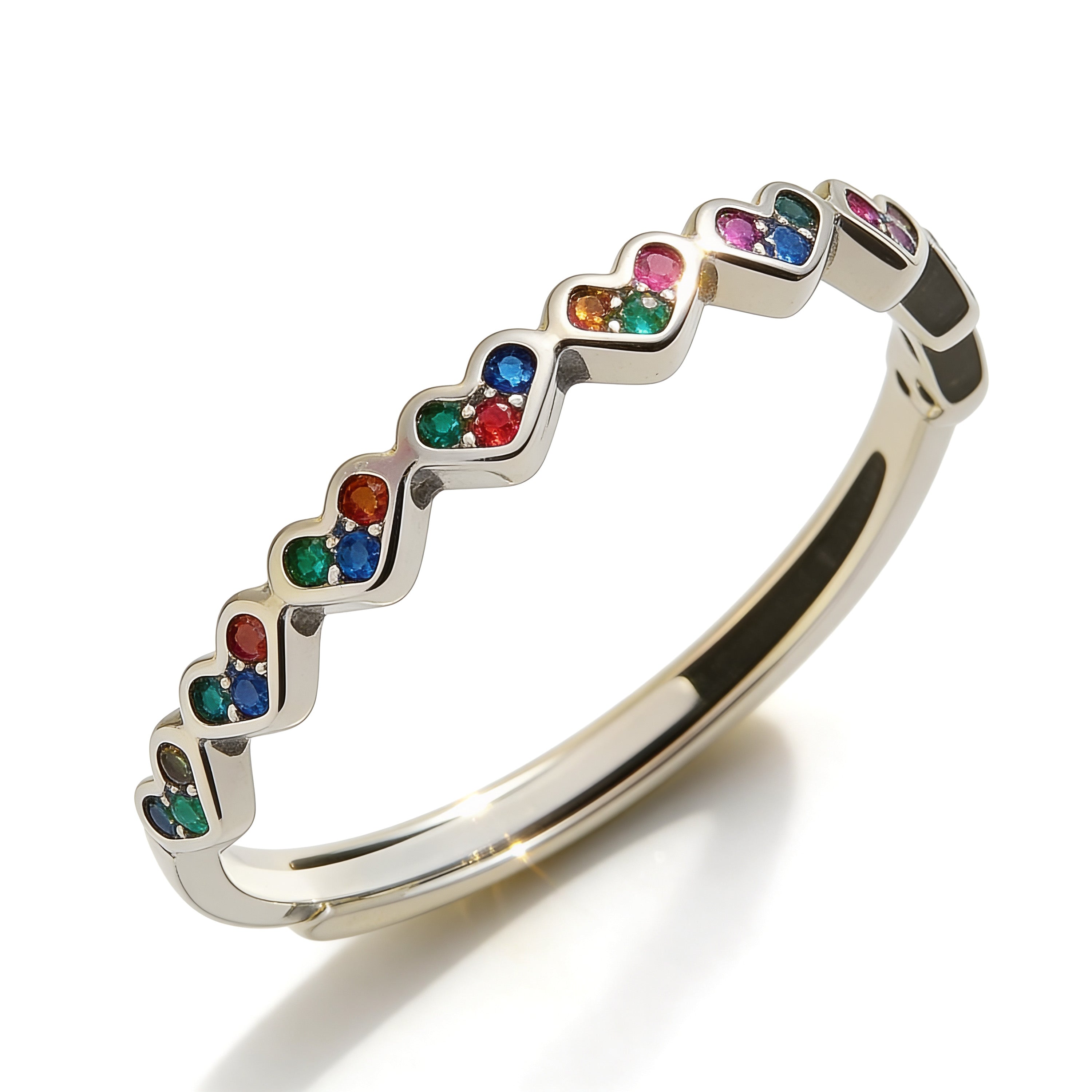 Silver ring with colorful gemstones on a white background
