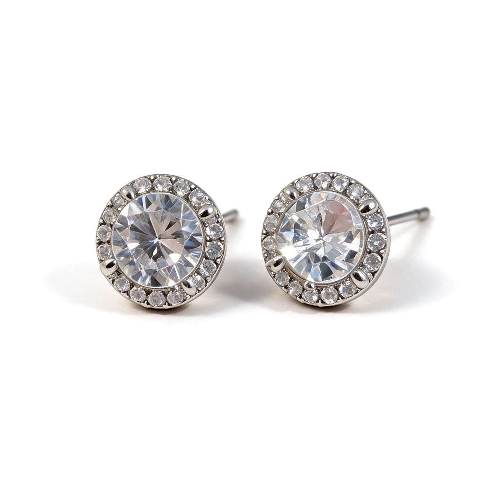 Round silver plated cubic zirconia stud earrings with a sparkling crystal halo on a white background