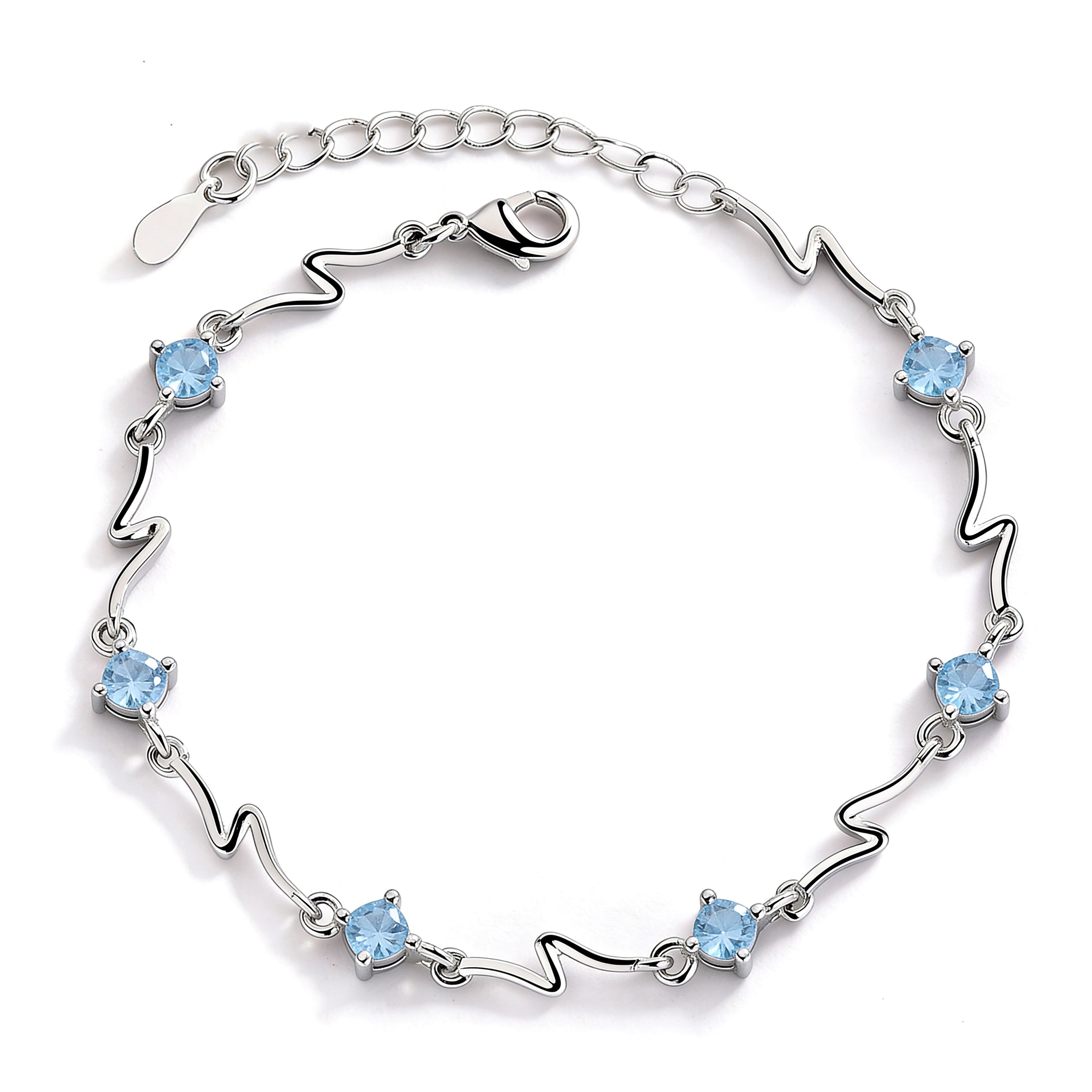 Silver plated bracelet with blue crystal charms.
