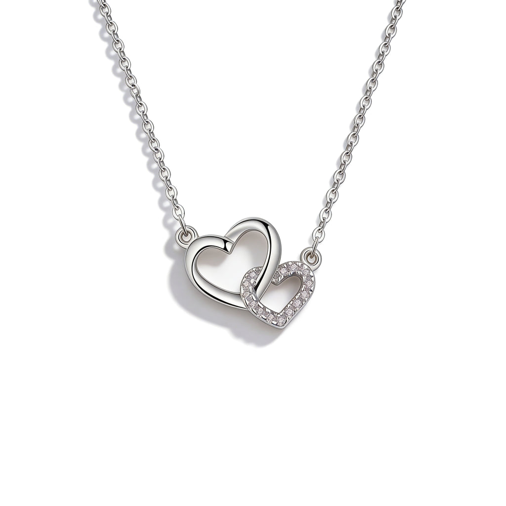 Silver plated crystal double heart pendant necklace.