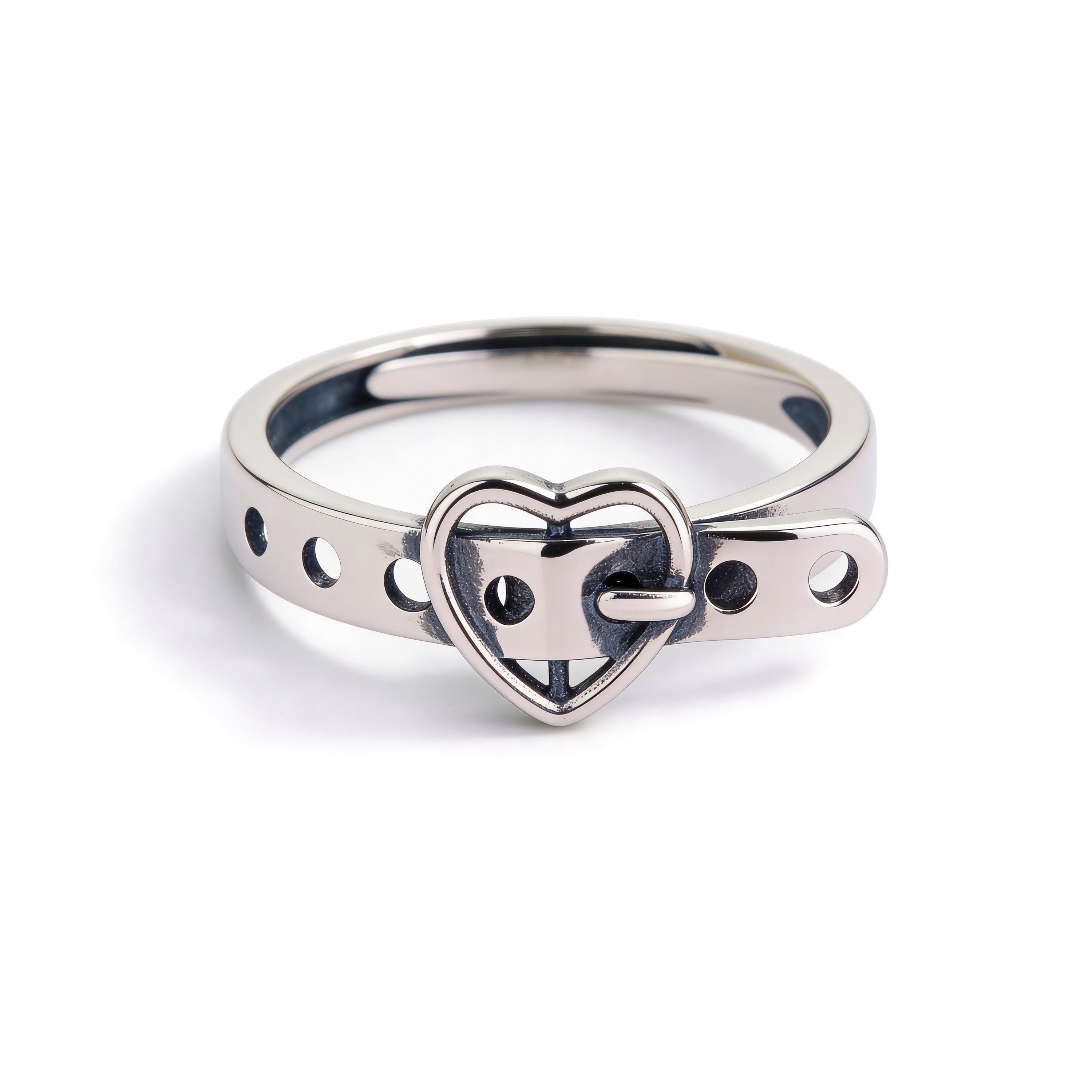 Silver ring with a heart-shaped design on a white background