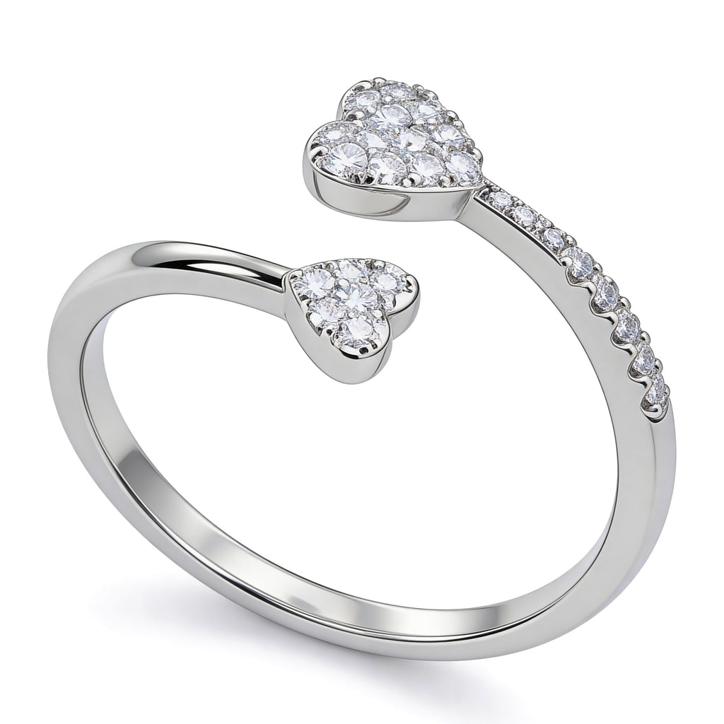 Double heart cubic zirconia ring with pavé accents in silver plated finish.