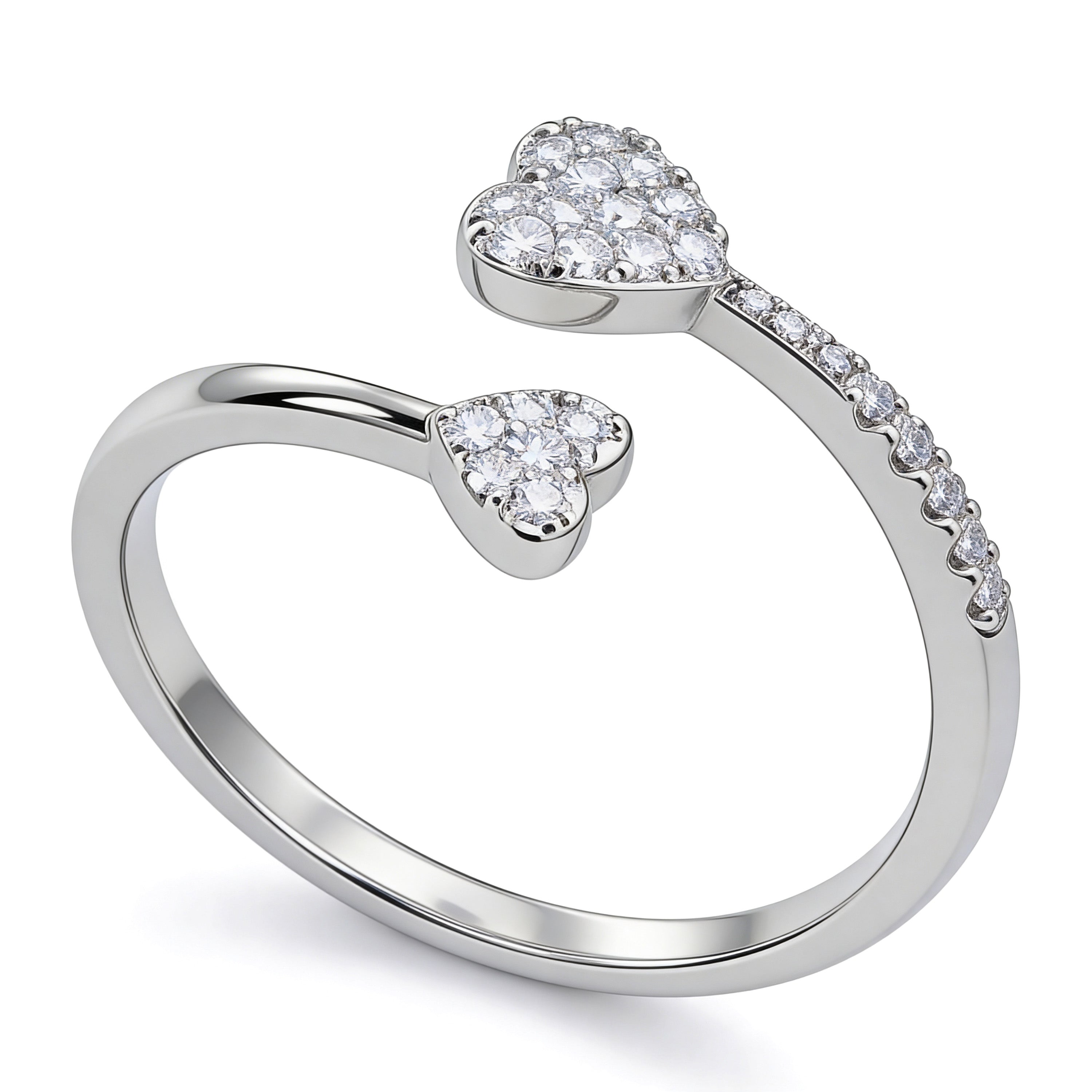 Double heart cubic zirconia ring with pavé accents in silver plated finish.