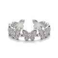 Silver plated adjustable butterfly ring with cubic zirconia stones.