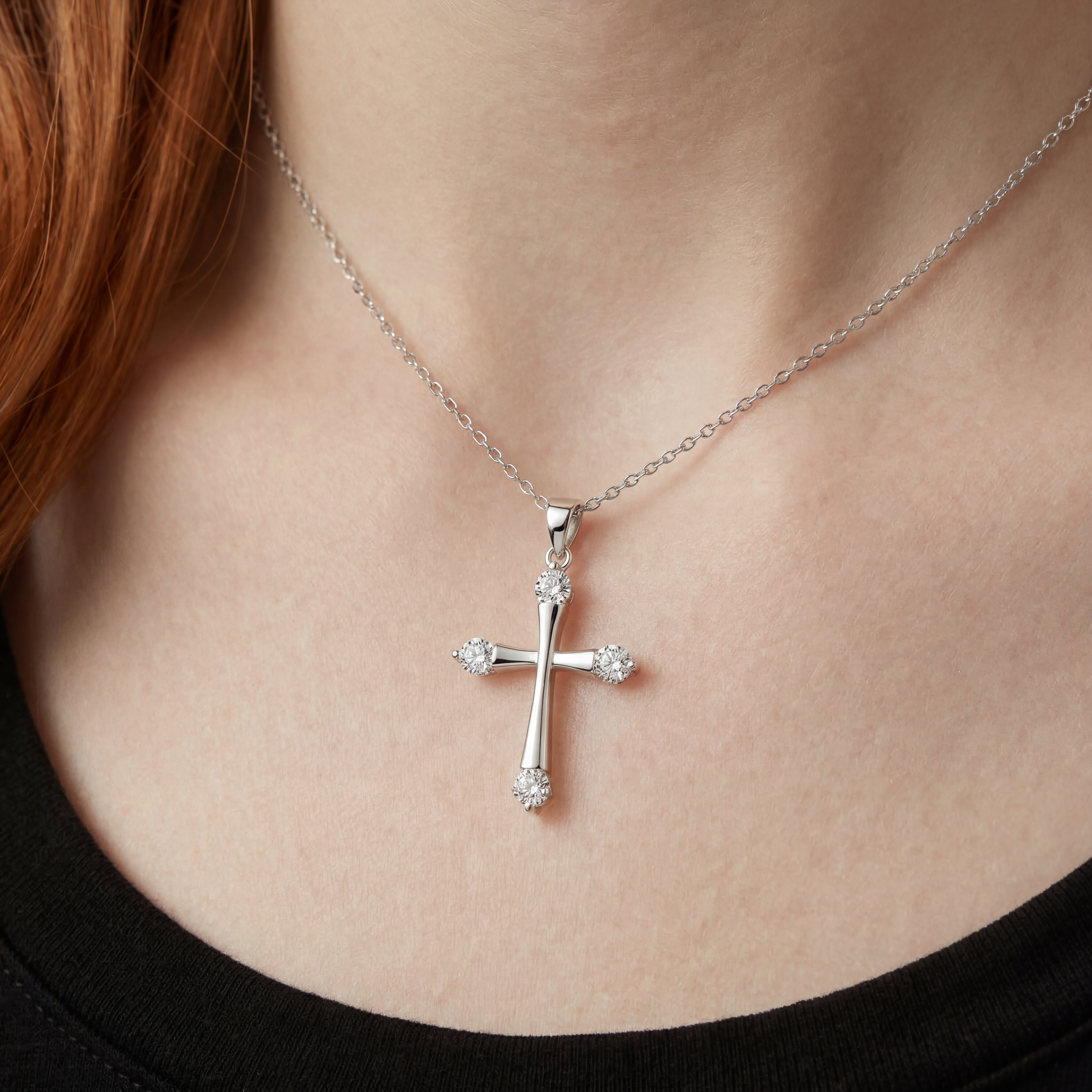 Sparkling crystal cross pendant close-up.