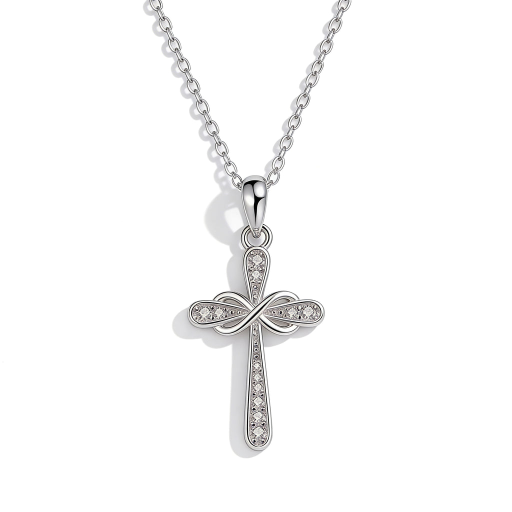 Silver plated crystal cross pendant necklace.