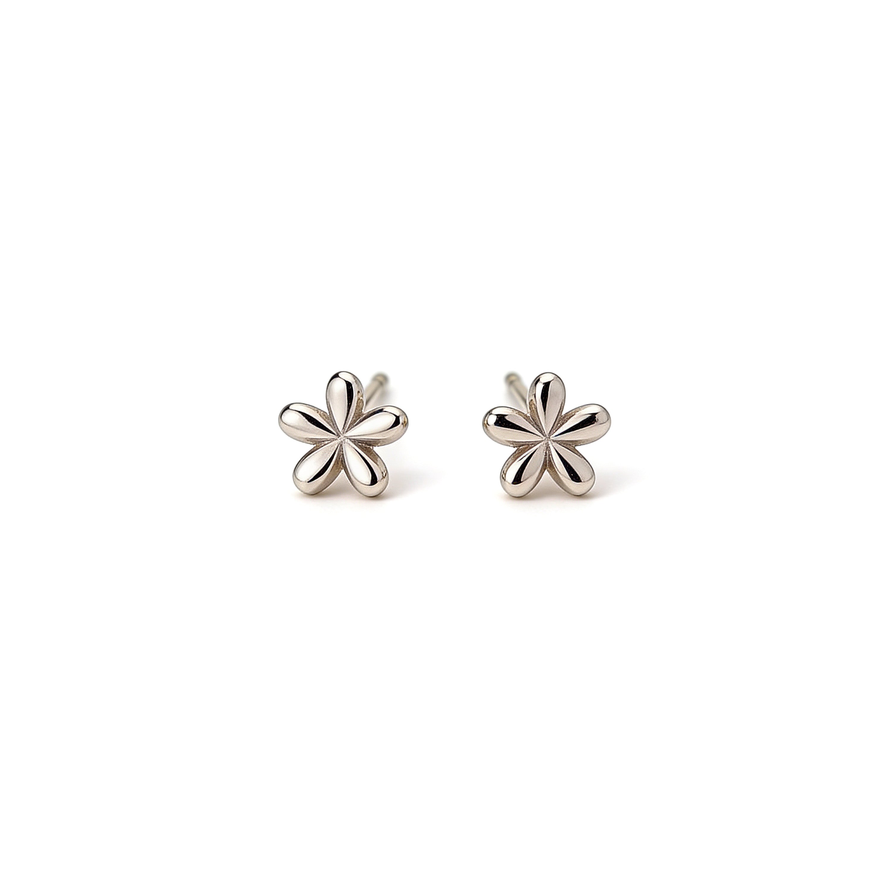 Tiny silver plated flower stud earrings.