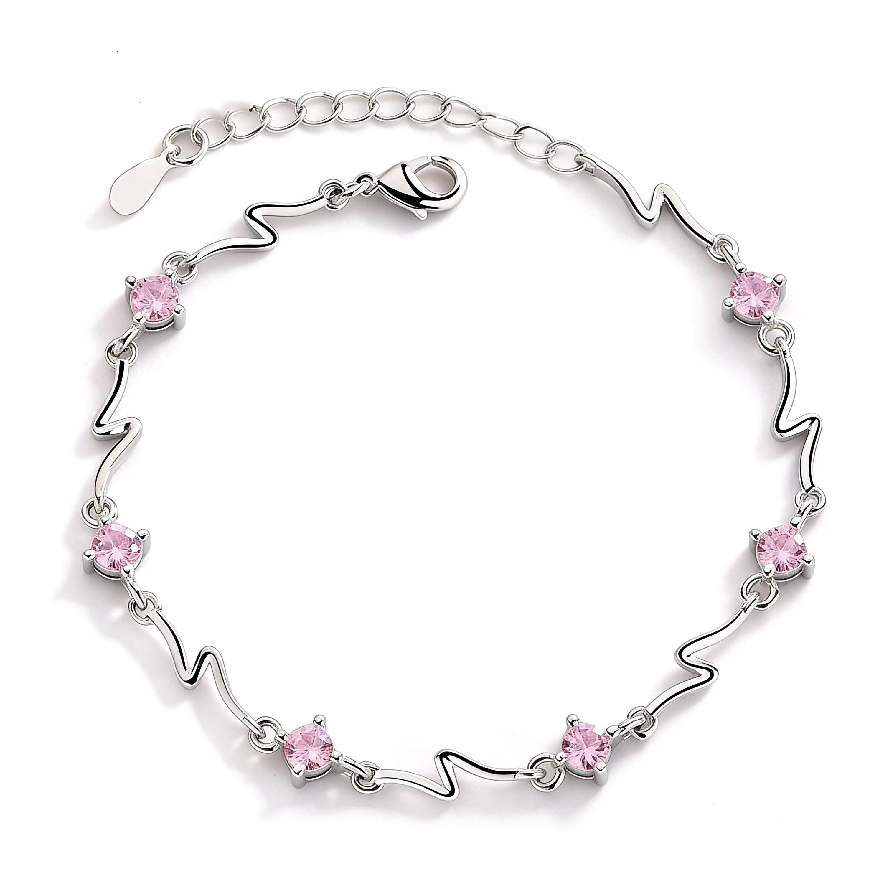 Silver plated pink crystal charm bracelet with light pink stones.