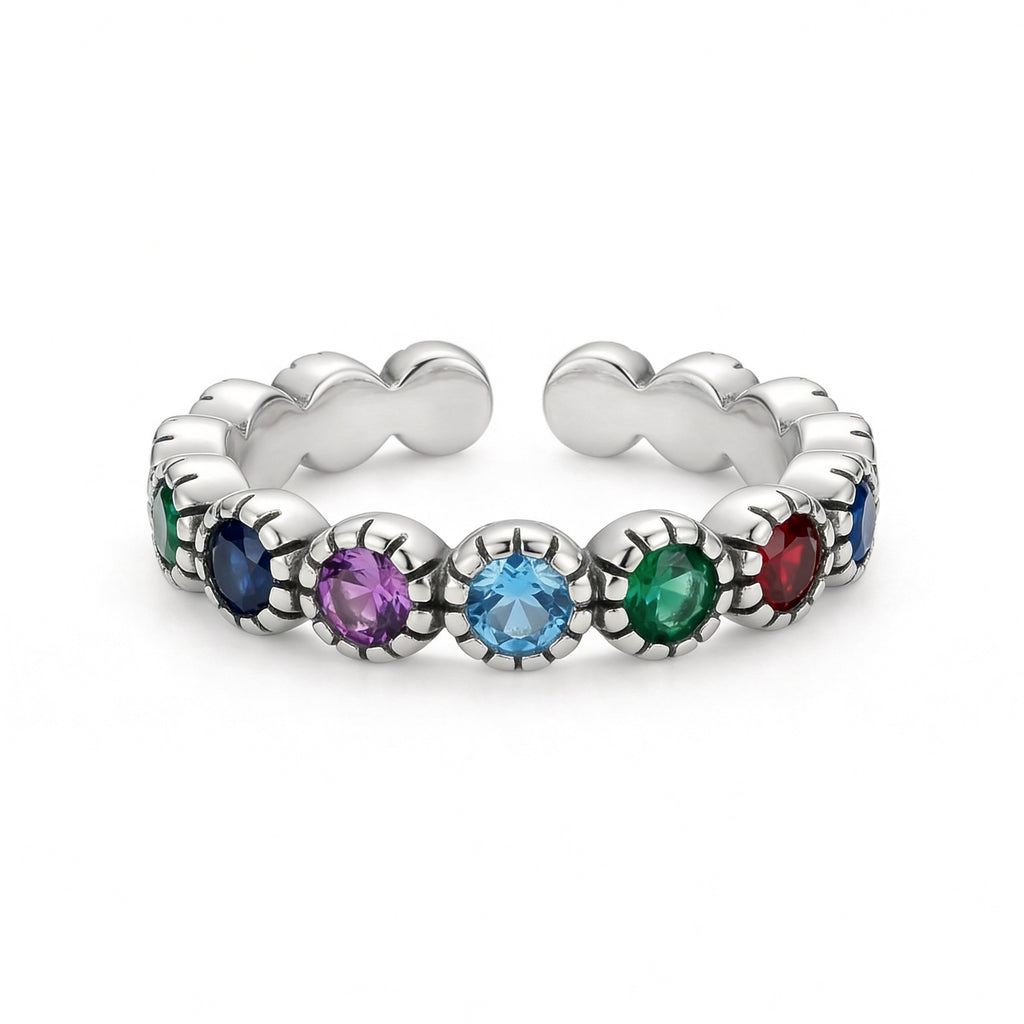 Silver plated adjustable rainbow band ring with multicolor gemstones.