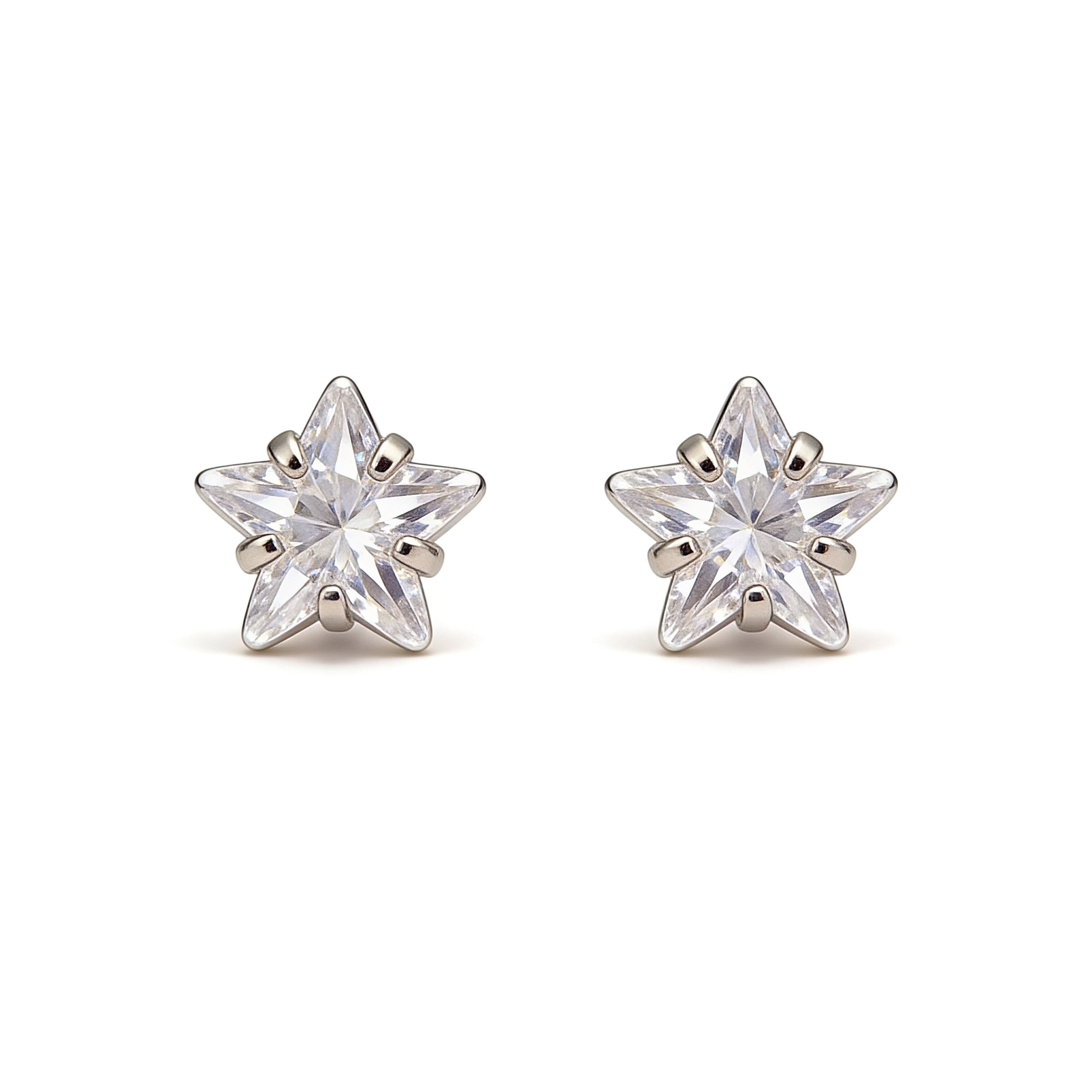 Star-shaped stud earrings with clear gemstones on a white background