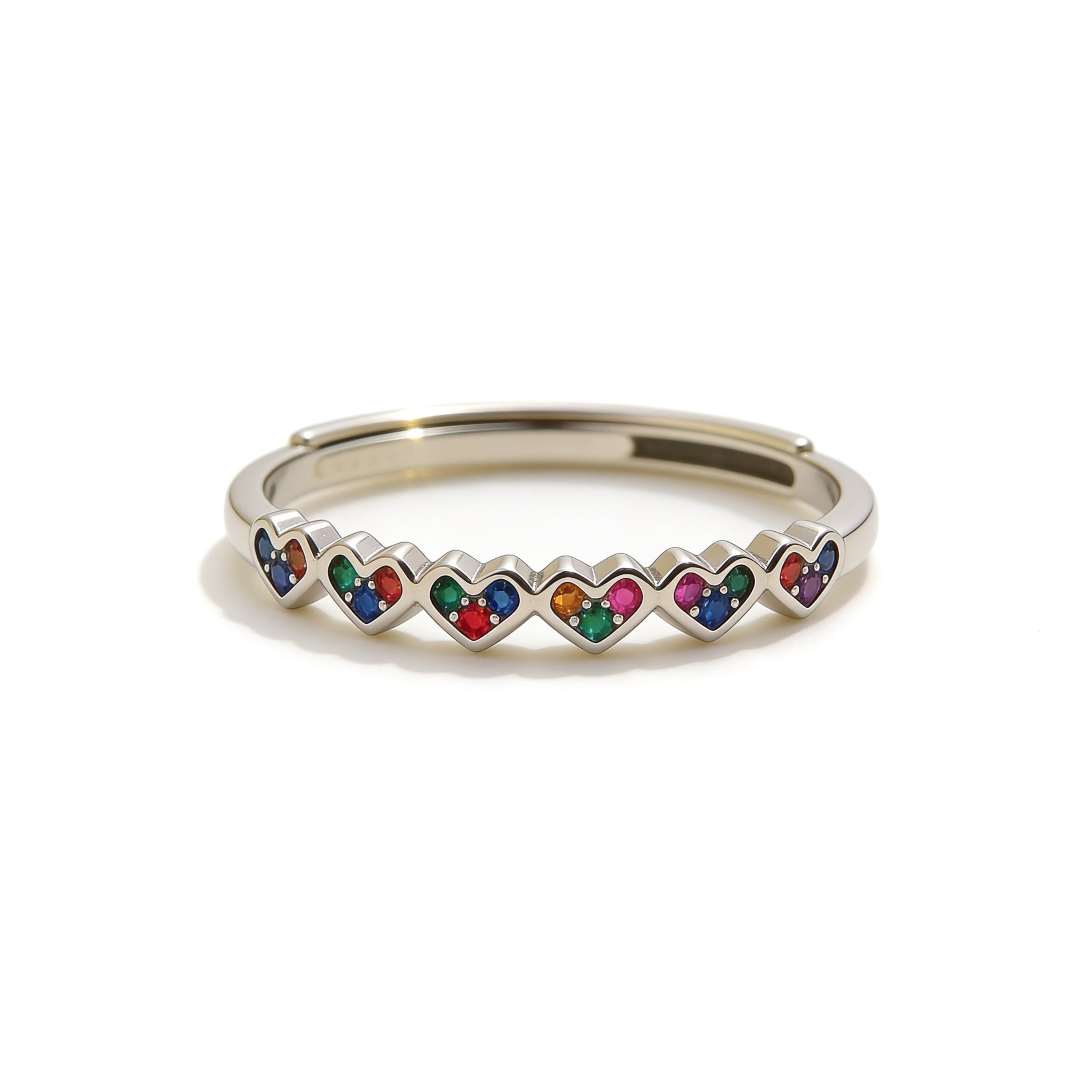 Silver plated adjustable rainbow heart ring with multicolor diamante stones.