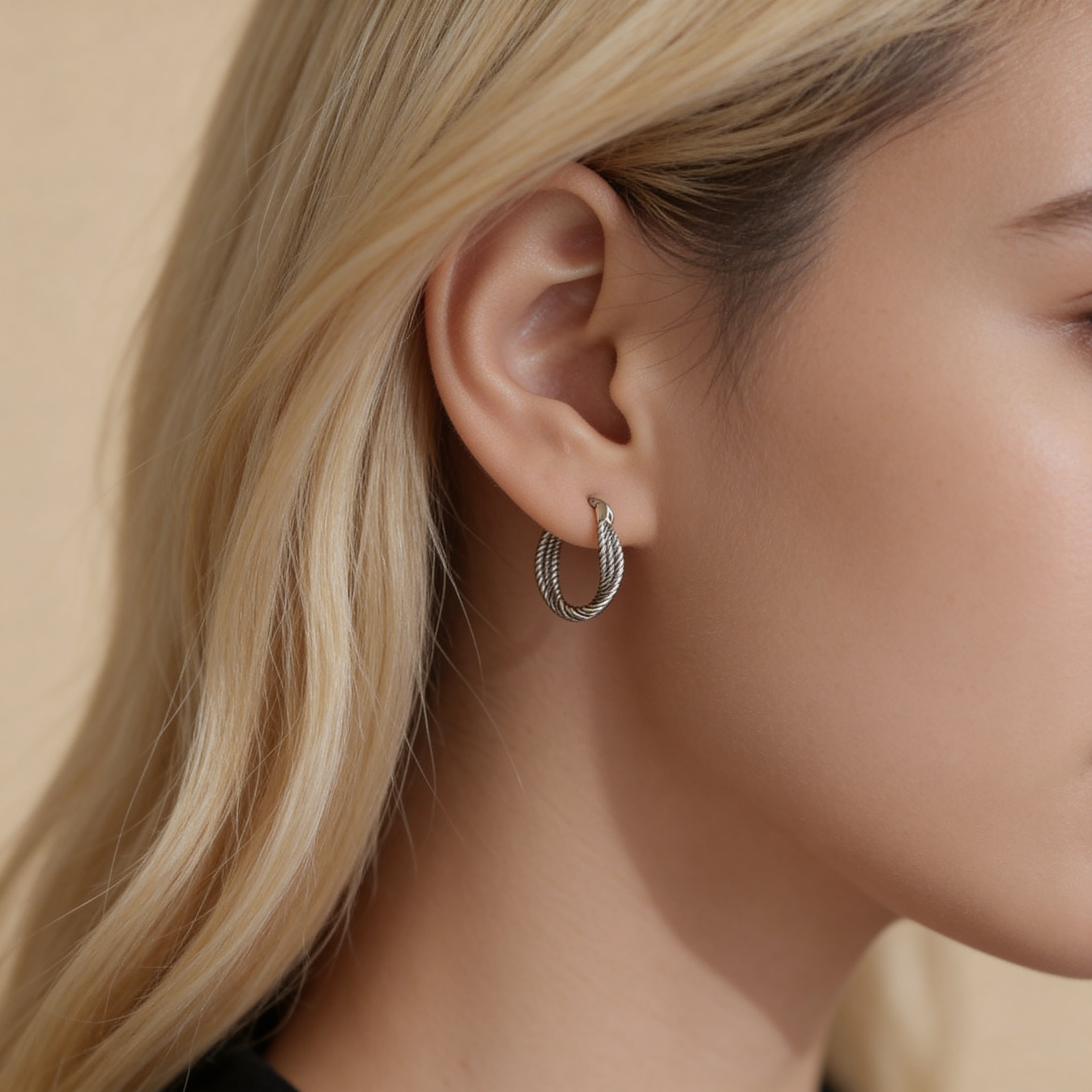 Textured silver hoop earrings lightweight everyday style.