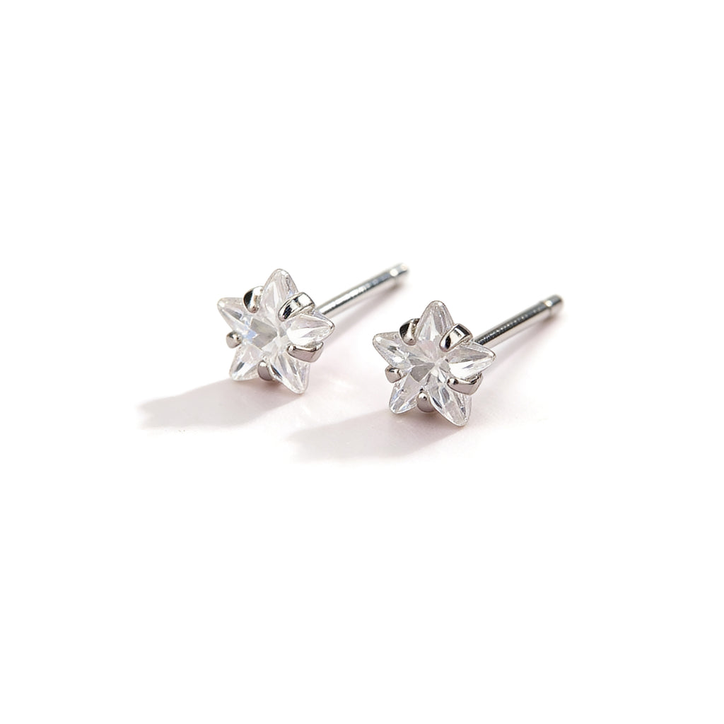 Tiny silver plated crystal star stud earrings.